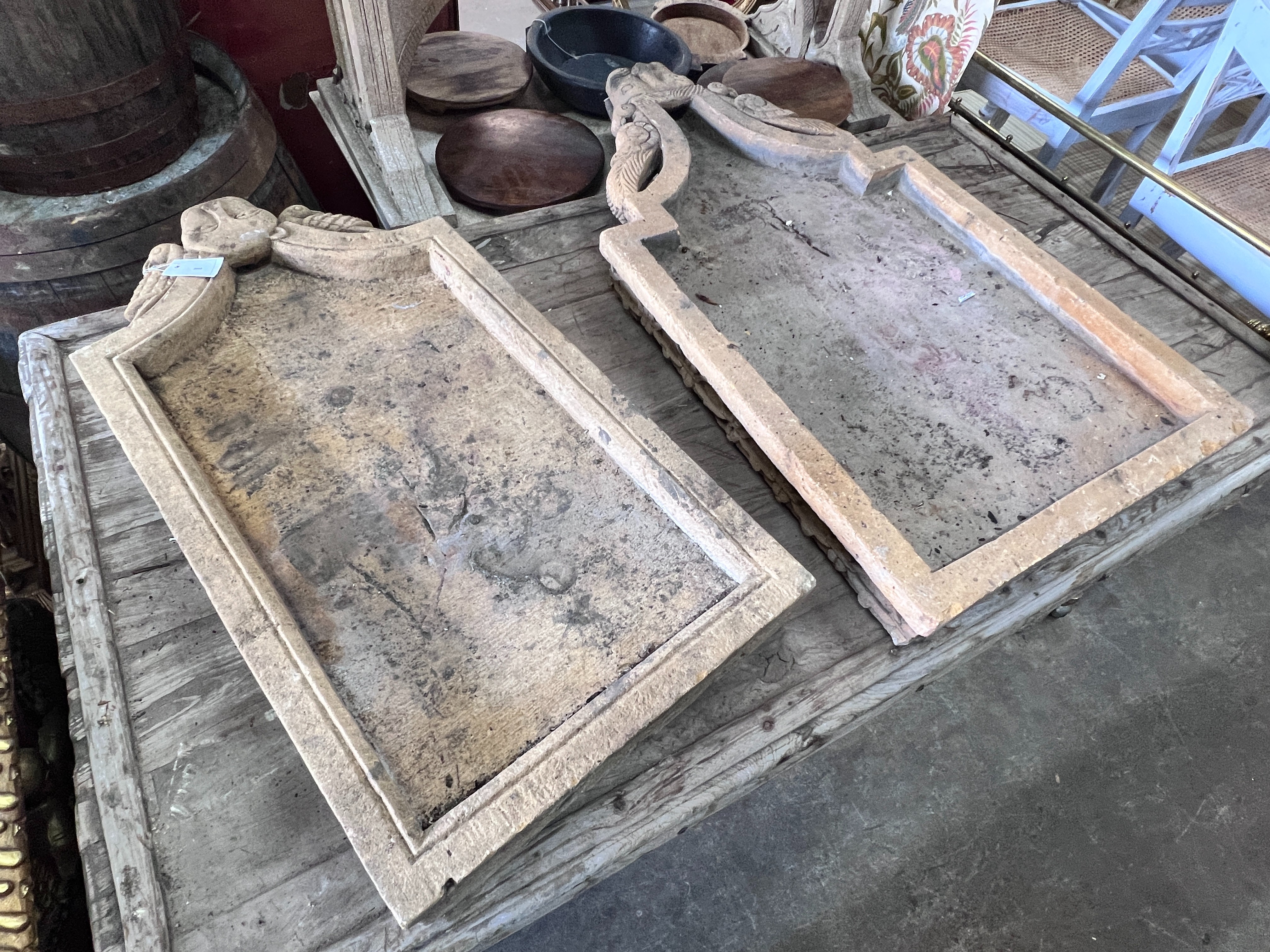 A pair of rectangular spouted stone troughs, larger height 111cm